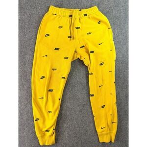 Nike Mens Joggers Sweatpants Size S Yellow All Over Print Logo Cuffed Ankle